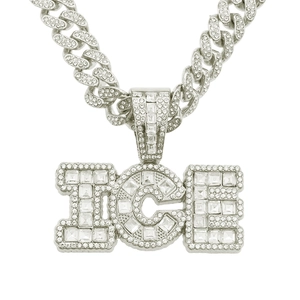 Close-up of hip hop silver necklace with ICE pendant and shimmering cubic zirconia stones