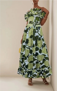 Detail of the ruffle off-shoulder neckline and green hydrangea print on the bikini set