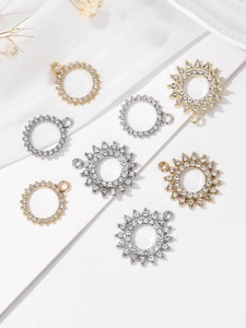 Close-up of luxury sunburst and geometric rhinestone pendants for DIY jewelry making
