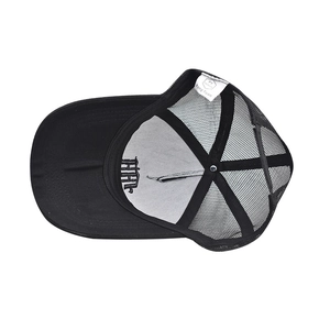 Detail of adjustable snapback strap and interior brand labels on black mesh trucker cap