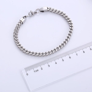 5mm silver stainless steel Franco chain bracelet shown with a ruler for size measurement