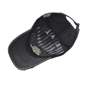 Close-up of internal structure of a washed cotton baseball cap with 100% cotton label