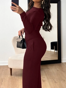 Detail view of the soft knitted fabric on the dark red long sleeve and pants set