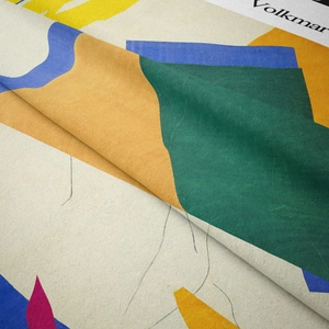 Close-up of bohemian wall tapestry with colorful abstract geometric patterns and soft texture
