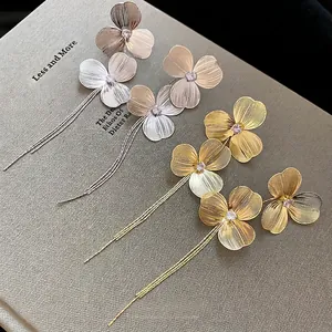 Elegant hollow flower tassel earrings with zircons and brushed petals in gold and silver
