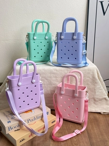 Mini EVA beach tote bag in mint green, light blue, purple, and pink with adjustable straps