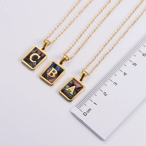 18k gold square pendant necklaces with colorful shells and letters A, B, and C