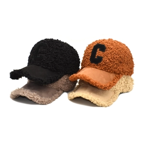 Thick sherpa baseball cap with suede brim and embroidered C patch in four colors