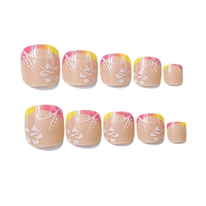 Glossy square press-on toenails with yellow pink gradient and white flower patterns
