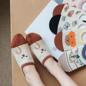 Detailed view of women's low-cut invisible socks with cartoon animal jacquard patterns