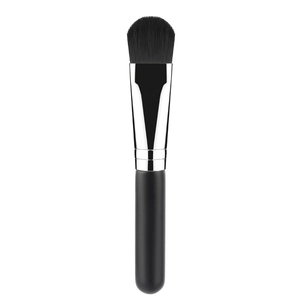 Single facial mask brush with soft black bristles and silver ferrule for skincare