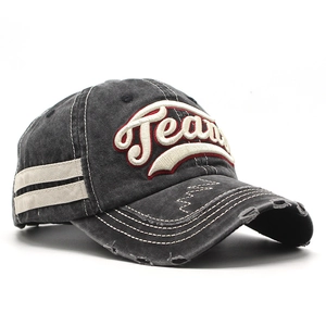 Detail of distressed cotton baseball cap featuring 3D Fear embroidery and side webbing