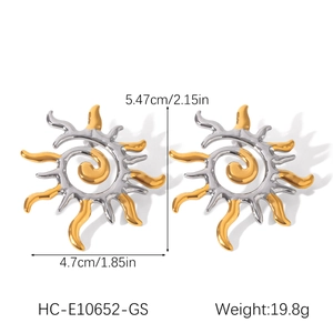 Detail showing two-tone sunburst spiral earrings with 5.47cm height and 4.7cm width dimensions