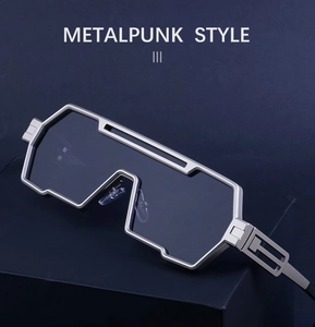Detailed view of silver futuristic metal punk sunglasses with geometric irregular frame