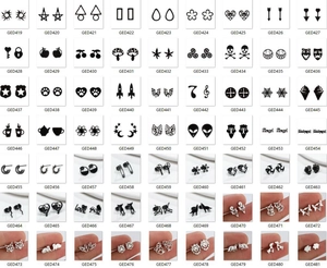 Detailed grid showing 63 styles of cute animal and geometric stud earrings in silver and black