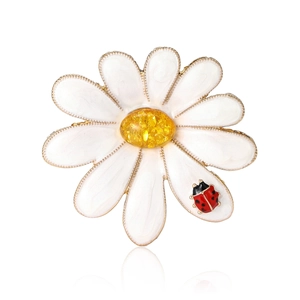 Elegant white enamel daisy brooch with a red ladybug detail on a gold-plated base