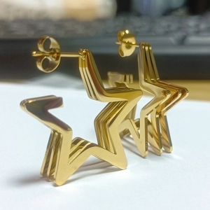 Three-layer gold stainless steel star stud earrings with a minimalist tiered design