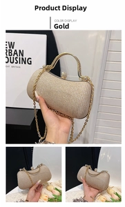 Detail of glitter gold evening clutch bag with crystal lock and metal handle