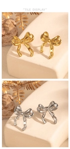 Detailed close-up of bow knot stud earrings in gold and silver liquid metal finish