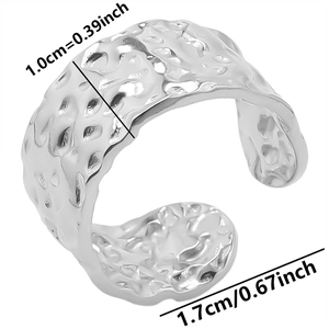 Detail showing 1.0cm width and 1.7cm inner diameter of the hammered steel open ring