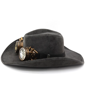Detail of dark grey steampunk fedora featuring vintage copper goggles and metal spikes