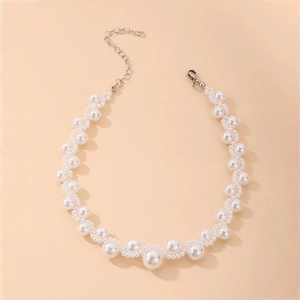 Detail of woven faux pearl choker with silver adjustable lobster clasp and chain