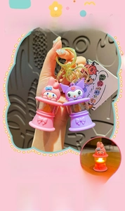 Detail of Sanrio characters Kuromi and My Melody glowing mini night light keychains