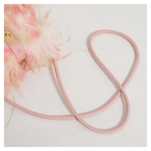 Detailed close-up of the pink faux fur texture and matching PU leather shoulder strap