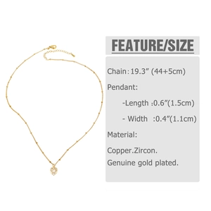 Detail showing the heart pendant dimensions and zircon settings on a gold chain