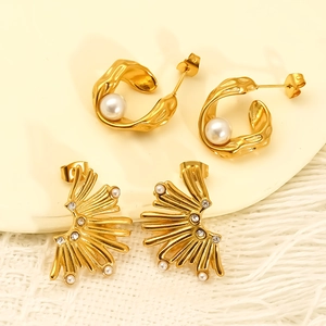 Irregular golden C-shaped pearl hoop earrings and sunburst rhinestone studs set