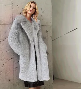 Detailed view of light gray faux fur coat with a large lapel collar for winter fashion