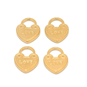 Set of four gold heart-shaped pendants with LOVE engraving for jewelry making