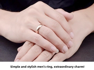Detailed view of a 4mm rose gold titanium steel ring with a polished minimalist finish