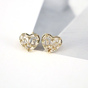 Close-up of heart earrings with micro-set cubic zirconia in gold plating