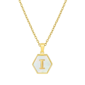 Detailed shot of hexagonal shell pendant with gold letter I on stainless steel chain