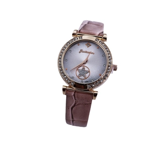 Elegant rose gold women's quartz watch with sparkling rhinestones and star dial detail