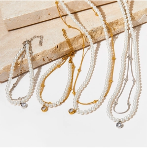 Ensemble collier et bracelet en perles double rang avec pendentifs en zircone