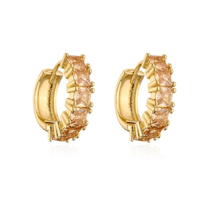 Detail of 18K gold plated hoop earrings with square-cut champagne zircon stones