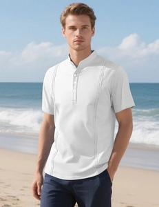 Detail of white beach shirt featuring lace hollow-out embroidery and mandarin collar