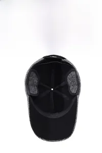Winter baseball cap with ear flaps featuring black and grey plaid and warm fleece lining