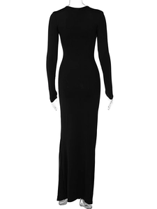Detailed back view of sleek black floor-length long sleeve dress with slim fit tailoring
