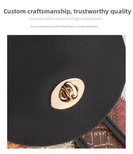 Macro view of gold oval twist lock on black lychee grain leather drawstring bucket bag