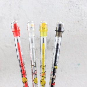 Detail of four cartoon chicken pencils in red white yellow and black plastic shells