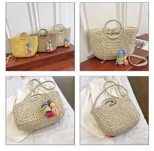 Detailed macro view of woven straw tote bag with colorful tassels and drawstring lining