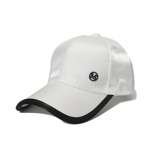 Glossy white baseball cap with black M logo badge and contrast brim trim details