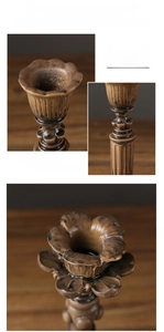Macro view of vintage bronze lotus candle holder with detailed distressed resin textures
