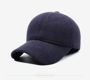 Detail showing the thick wool texture and warm plush lining of the winter baseball cap