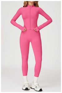 Detailed texture of seamless ribbed fabric and thumbhole cuff on pink yoga jacket