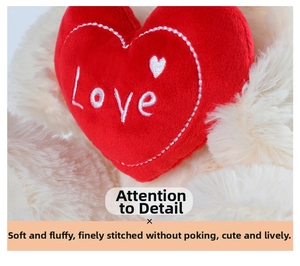 Macro shot of embroidered Love text on a red plush heart with cream teddy bear fur