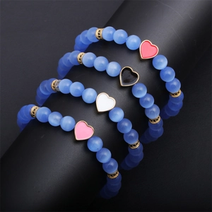 Bracciale Con Perline Occhio Di Gatto Rame Pendente Cuore Micro Pavé Zircone Corda Elastica Gioielli Per Donne Uomini Coppia Elegante Moda